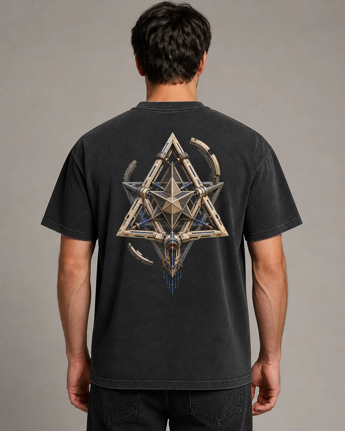 Digital concept mockup of a washed-black shirt featuring The Phase Chariot, an engineered star-tetrahedron design.